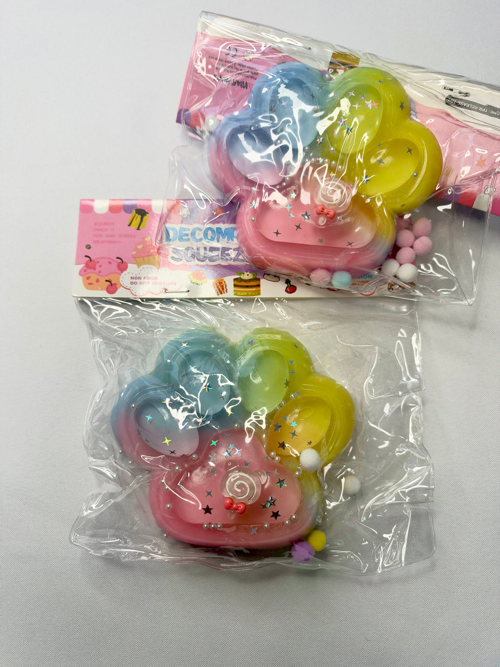 Taba patte de chat bleue vert jaune rose