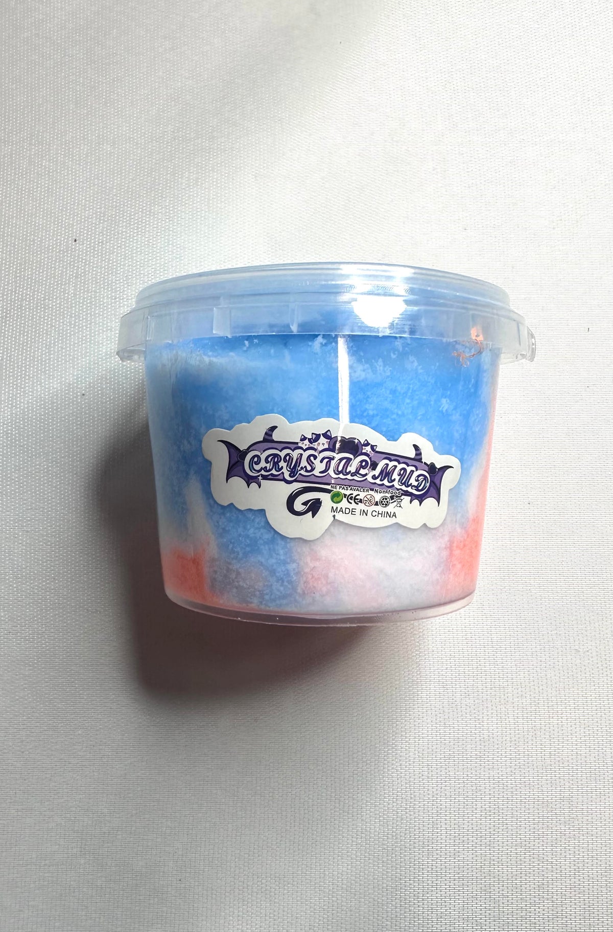 Slime bleu blanc et orange