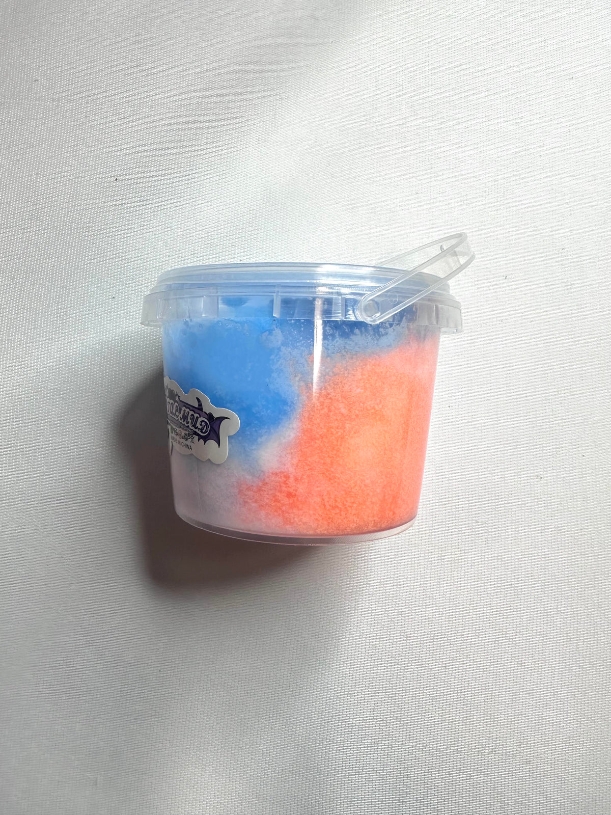 Slime bleu blanc et orange